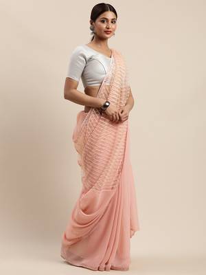 Peach woven faux georgette saree with blouse 1