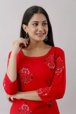 Women Rayon printed kurta with front all over embroidered and hand work with plain Palazzo Pant  4