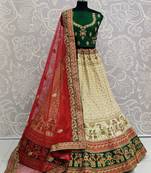 Cream embroidered satin semi stitched lehenga