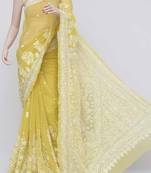 Green embroidered georgette saree with blouse