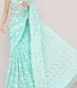 Dark aqua blue embroidered georgette saree with blouse