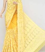 Yellow embroidered georgette saree with blouse