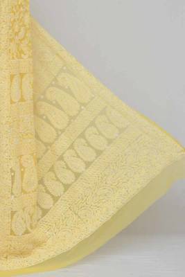 Yellow embroidered georgette saree with blouse 2