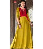 yellow ethnic motif rayon long  kurtis