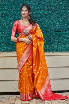 Orange woven banarasi silk saree with blouse