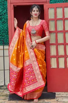 Orange woven banarasi silk saree with blouse