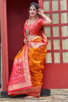 Orange woven banarasi silk saree with blouse