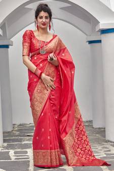 Pink woven banarasi silk saree with blouse