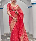 Pink woven banarasi silk saree with blouse