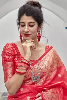 Pink woven banarasi silk saree with blouse