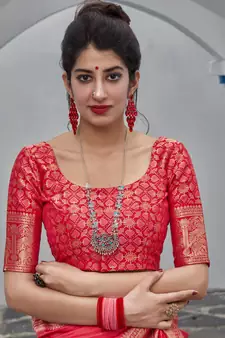 Pink woven banarasi silk saree with blouse
