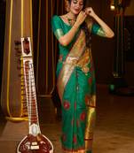 Green woven banarasi saree with blouse