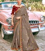 Light brown embroidered satin saree with blouse
