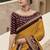 Mustard embroidered satin saree with blouse