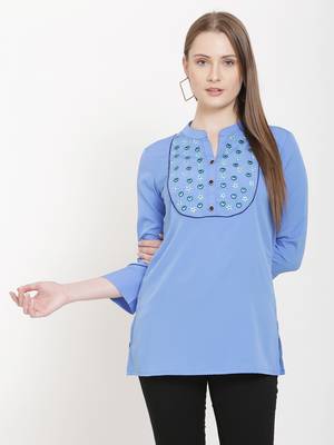 Sea-green embroidered crepe tunics 1