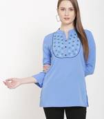 Sea-green embroidered crepe tunics