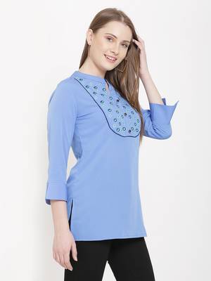 Sea-green embroidered crepe tunics 3