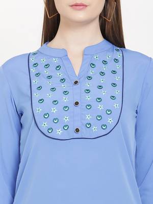 Sea-green embroidered crepe tunics 5
