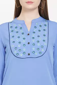 Sea-green embroidered crepe tunics