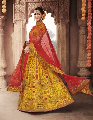 Yellow embroidered silk semi stitched lehenga 1