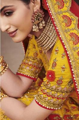 Yellow embroidered silk semi stitched lehenga 3