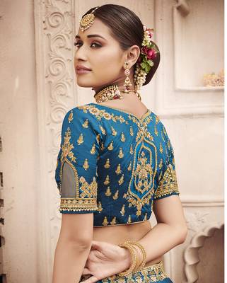 Teal embroidered silk semi stitched lehenga 3