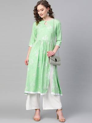 Green printed rayon kurtis 4