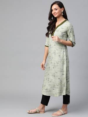 Green printed rayon kurtas-and-kurtis 3