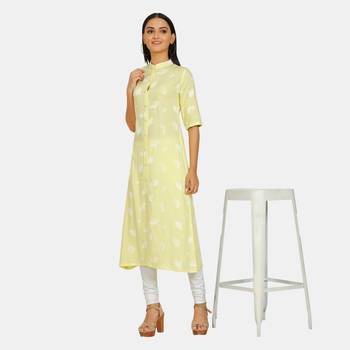 Yellow printed rayon kurtas-and-kurtis 4
