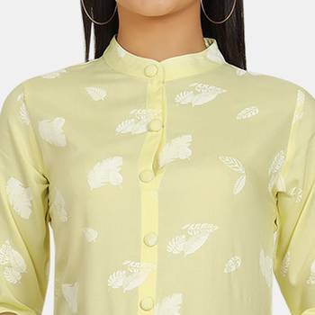 Yellow printed rayon kurtas-and-kurtis 5
