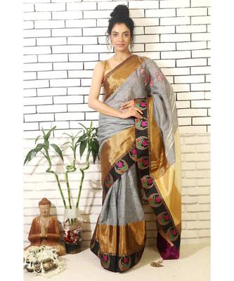 grey linnen saree with hand embroidered applique jhumkis on shoulder and brocade border and brocade blouse piece 1