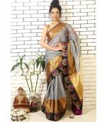 grey linnen saree with hand embroidered applique jhumkis on shoulder and brocade border and brocade blouse piece