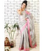 Grey Linen Cold Shoulder Saree with Pink Brocade Applique work on the shoulder and Pink Border with a Blouse Piece.