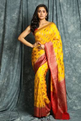 Yellow woven silk saree with blouse 1
