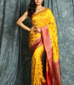 Yellow woven silk saree with blouse