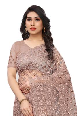 Beige embroidered net saree with blouse 3