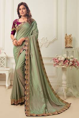 Green embroidered silk blend saree with blouse 1