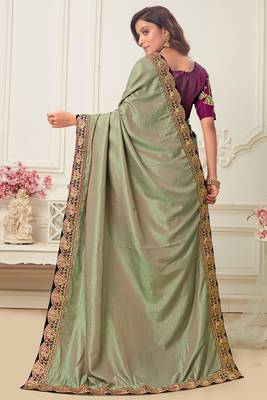 Green embroidered silk blend saree with blouse 4