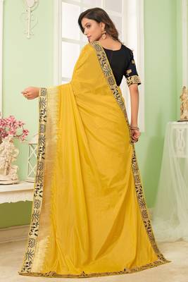 Yellow embroidered silk blend saree with blouse 4