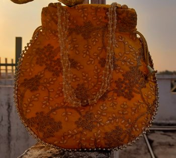 Orange Colored Sequin Worked Pearl Chained Potli Bag 1