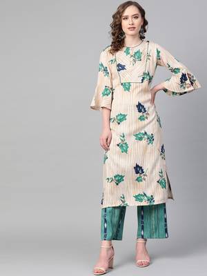 Mandarin Neck, Cream base color and Green color print women Kurta palazzo set 1