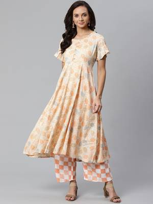 Cream and Orange printed kurta with palazzos Set 1