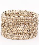 Beige bangles-and-bracelets