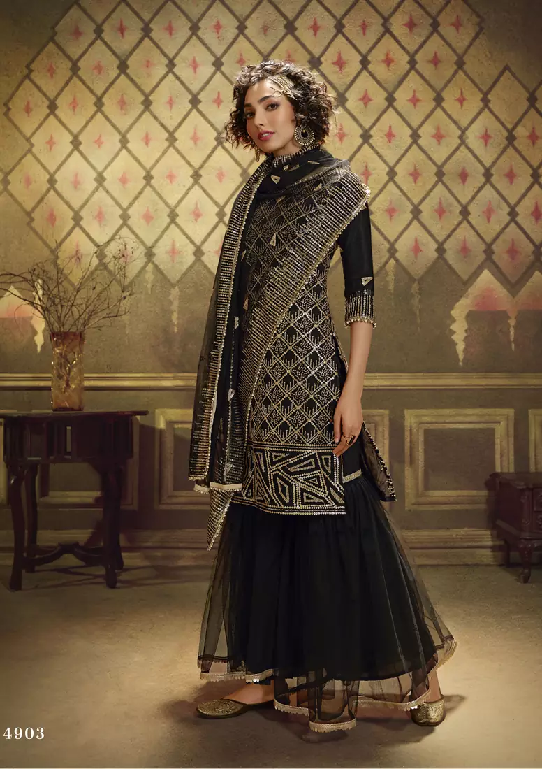 Catching Black sequins embroidered net Sharara Salwar kameez