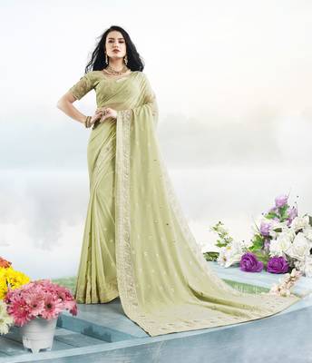 Parrot green embroidered faux georgette saree with blouse 1