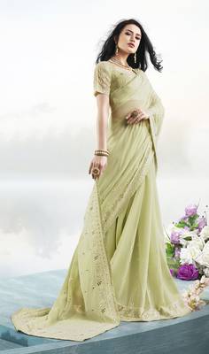 Parrot green embroidered faux georgette saree with blouse 2