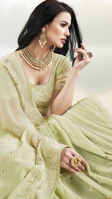 Parrot green embroidered faux georgette saree with blouse 3