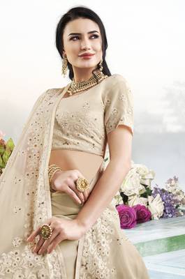 Cream embroidered faux georgette saree with blouse 2