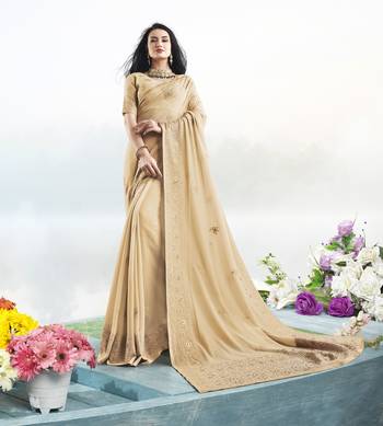 Cream embroidered faux georgette saree with blouse 1