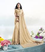 Cream embroidered faux georgette saree with blouse